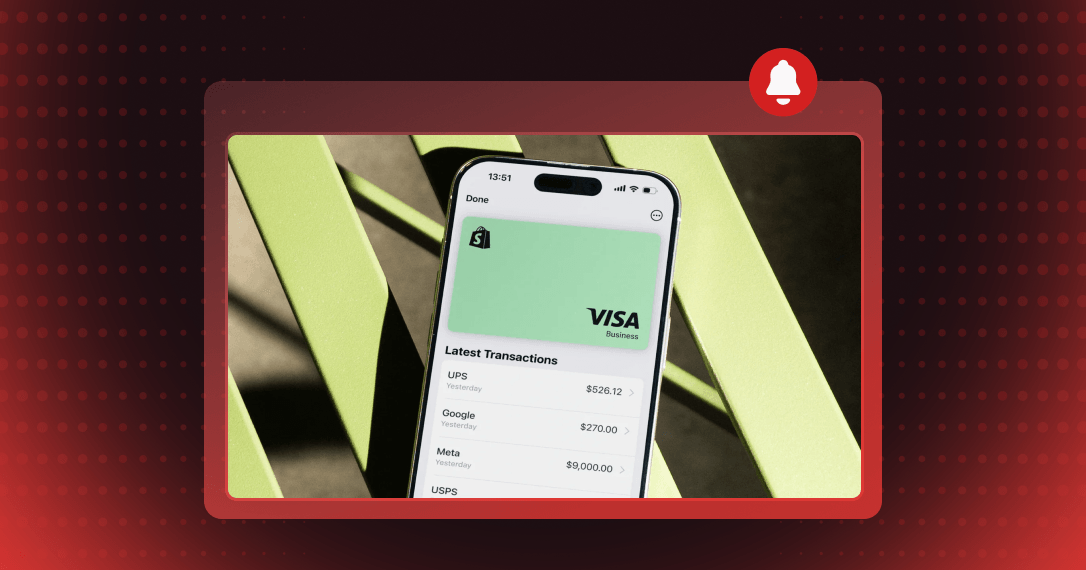 Phone showing a Shopify card with its latest transactions