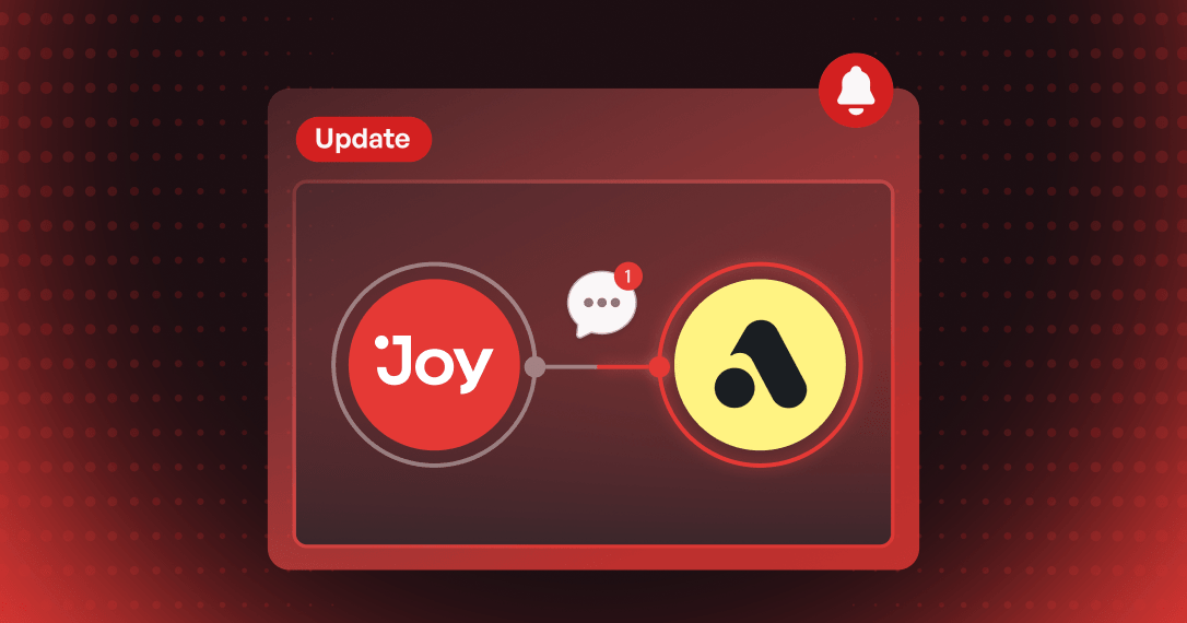A Joy loyalty event, a Gold tier reached, turning into an SMS on a phone